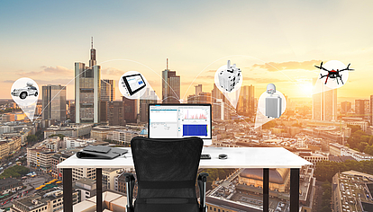 Workstation at sunrise with monitoring devices for automated spectrum monitoring and interference detection.